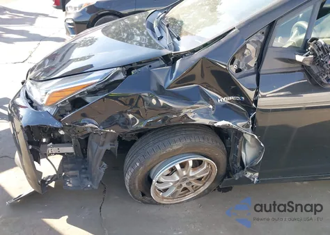 2021 Toyota Prius Le from USA, damaged, VIN JTDKAMFU6M3142669